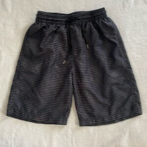 Zella boys swim trunks size S black with print.